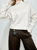 JERSEY OVERSIZE DE CUELLO ALTO